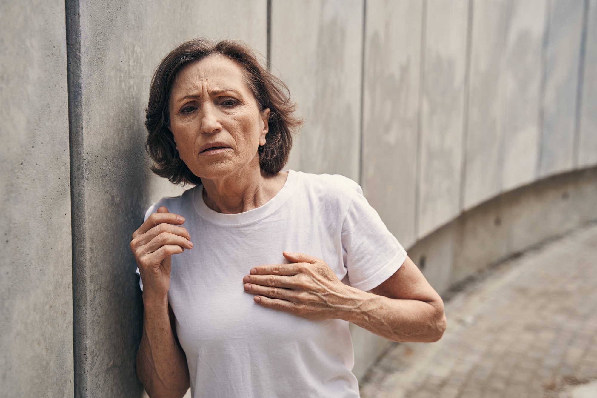 Aged Woman Having Warning Signs of Heart Attack